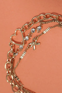 JOSSLYN by Wall to Wall - MULTI LAYER BOW HEART STATION RHINESTONE BRACELET