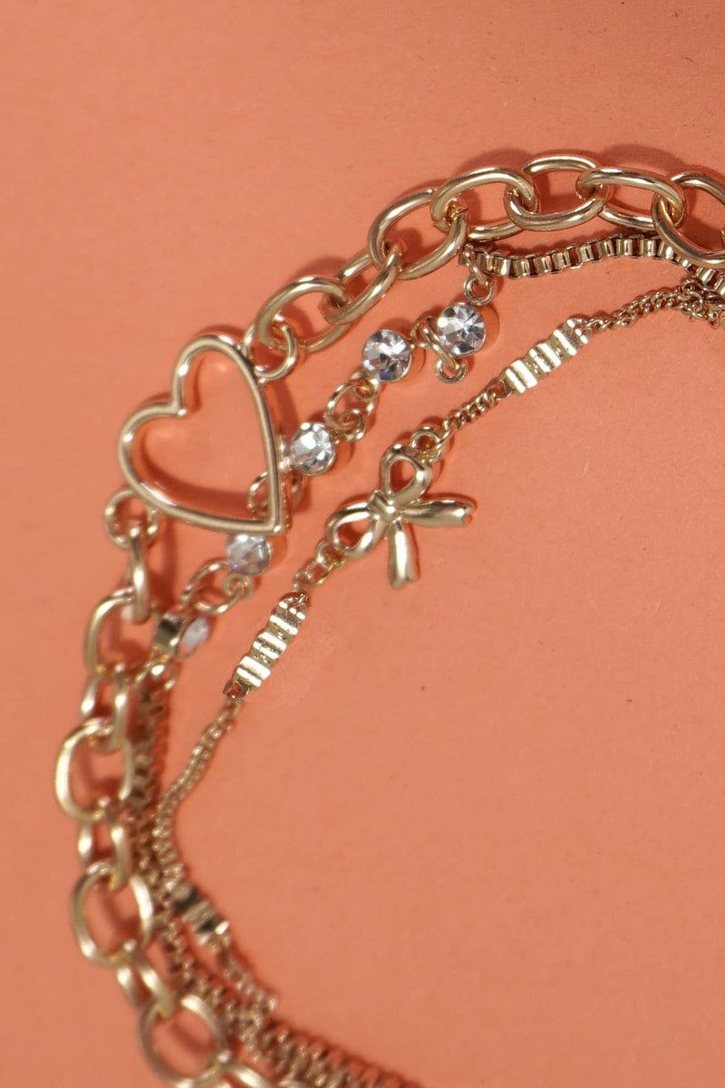 JOSSLYN by Wall to Wall - MULTI LAYER BOW HEART STATION RHINESTONE BRACELET